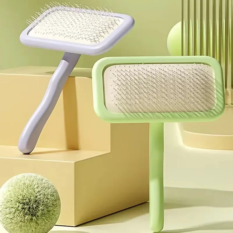 Professional pet grooming brush with stainless steel teeth and ergonomic handle for grooming dogs and cats.
